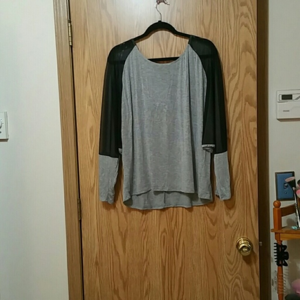 Grey top with black mesh sleeves